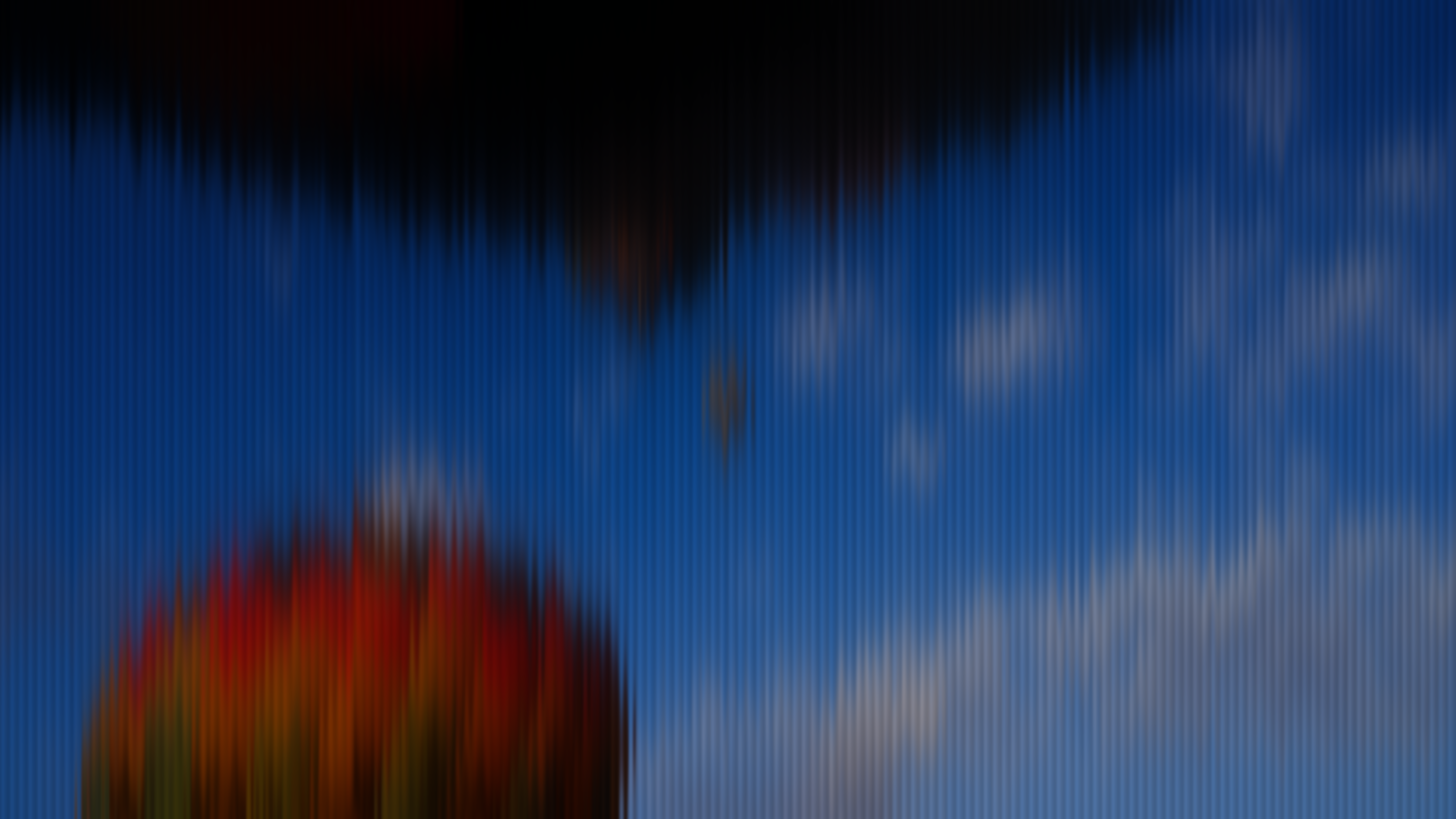 Washed abstract of a balloon crest rising into deep blue sky